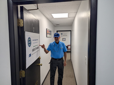 tech by the office door